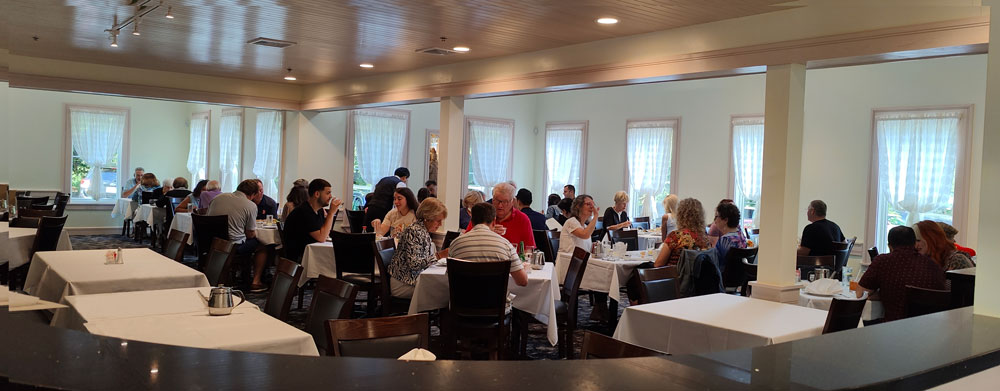 Su Chang's front dining room, with guests enjoying their meals.